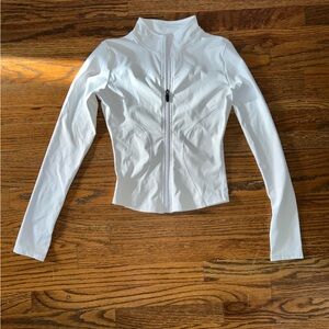 Woman’s white athletic zippered shirt